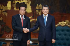 政府总理黎明兴会见老挝中央检查委员会主任、国家监察总署署长万赛。图自越通社