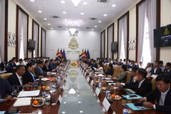对话现场。图自越通社