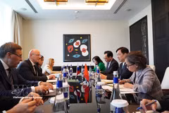 会谈现场。图自越通社