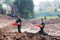 胡志明市黎氏莲公园第二阶段5天归集58具烈士遗骸。图自越通社