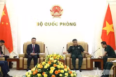 阮文贤上将会见中国公安部部长助理吕武钦。图自人民军报