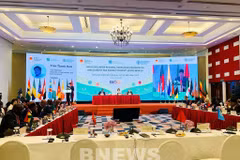 会议场景。图自越通社