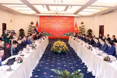 会议场景。图自越通社