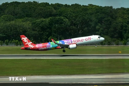 亚航飞机。图自AFP/越通社