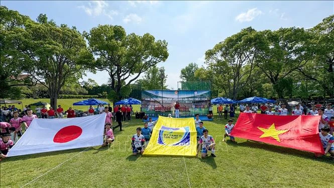 旅居日本九州地区越南人足球比赛举行。图自越通社