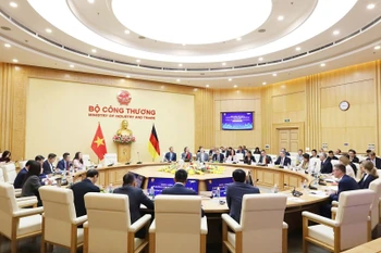 会议现场。图自越通社