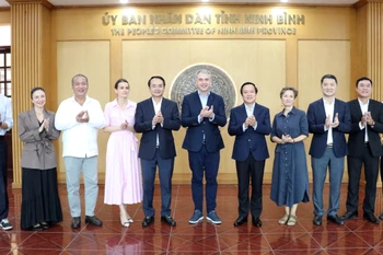 双方代表合影。图自越通社