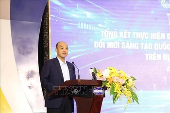 岘港市人民委员会副主席黎光南发言。图自越通社