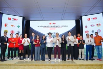 与会代表合影。图自越通社