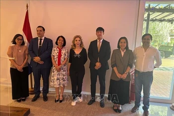 各位代表合影。图自越通社