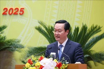 阮德忠同志发言。图自越通社