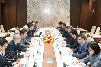 会见现场。图自越通社