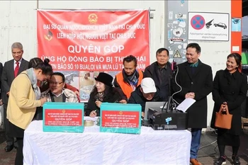 捐款活动现场。图自越通社