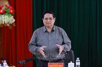 越南政府总理范明政发表总结发言。图自越通社