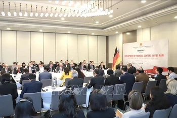座谈会现场。图自越通社