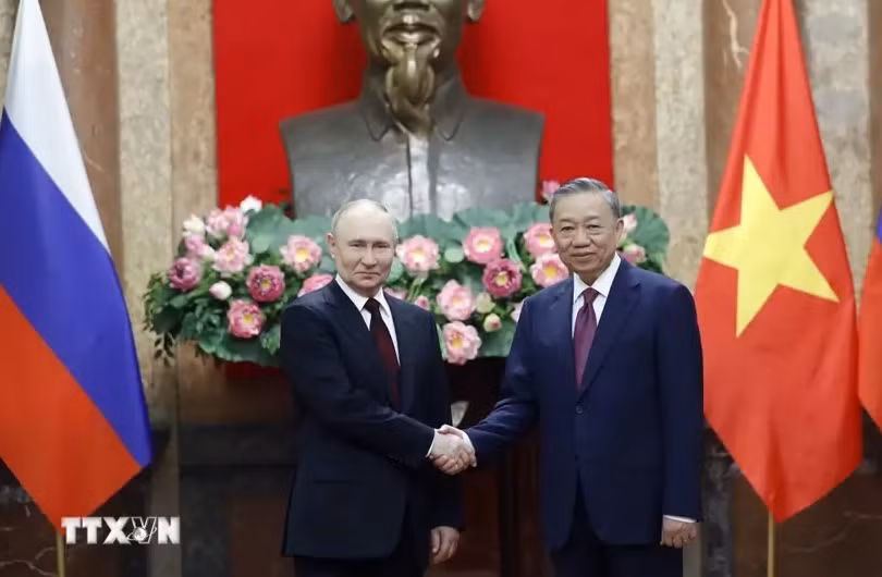 越南国家主席苏林和俄罗斯总统普京。图自越通社