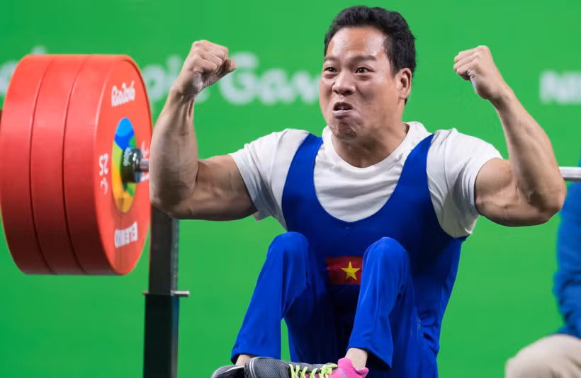 越南残疾举重运动员黎文功。图自越通社