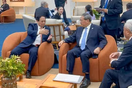越南政府总理范明政会见中国国务院总理李强。图自互联网