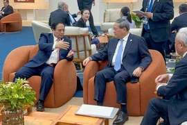 越南政府总理范明政会见中国国务院总理李强。图自互联网