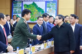 政府总理范明政调研永福省经济社会发展情况。图自越通社