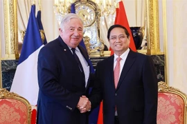 范明政总理会见法国参议院议长热拉尔·拉尔歇