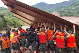 截至目前，全国63个省市中已有21个不复存在临时住房和危旧房。图自越通社