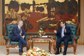 政府总理范明政会见比利时驻越南大使卡尔·范登博舍。图自越通社