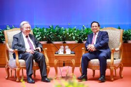政府总理范明政会见联合国秘书长古特雷斯。图自越通社