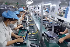 太原省恬瑞工业园区进行手机零部件组装。图片来源：越通社
