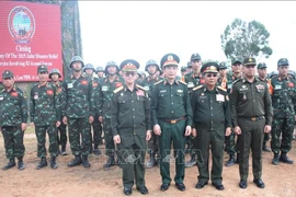老挝政府副总理占沙蒙·占雅拉（Chansamone Chanyalath），越南国防部部长潘文江大将，柬埔寨副首相兼国防部长狄赛哈(Tea Seiha大将出席活动。图自人民军报