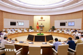 越南政府总理范明政主持召开政府专题会议。图自越通社