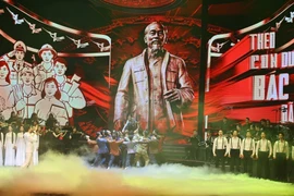 《坚定信念永远跟党走》特别政论艺术音乐会上的一个节目。 图片来源：越通社