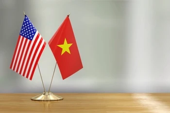 越美两国国旗。图自越通社