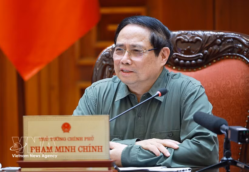 范明政在会上发表讲话。图自越通社