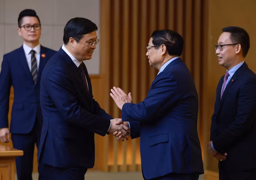 越南政府总理范明政会见了中共中央委员、广西壮族自治区党委副书记、自治区人民政府主席韦韬。图自越通社