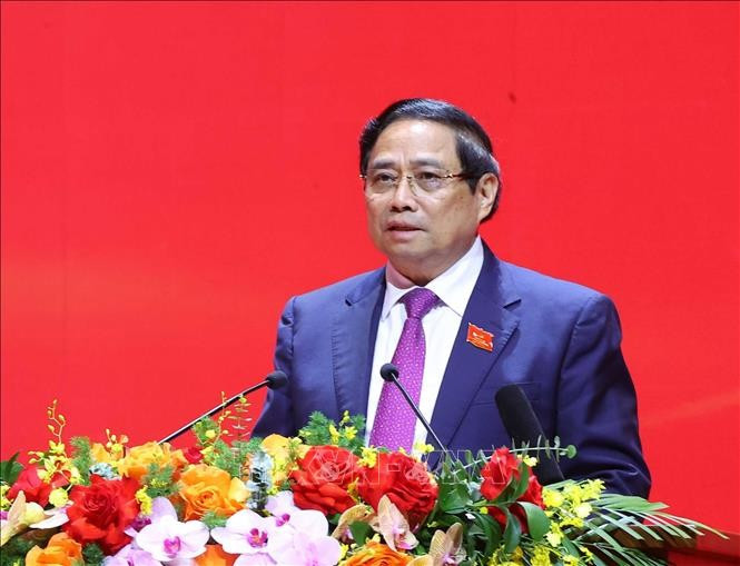 政府总理范明政主持会议。图自越通社