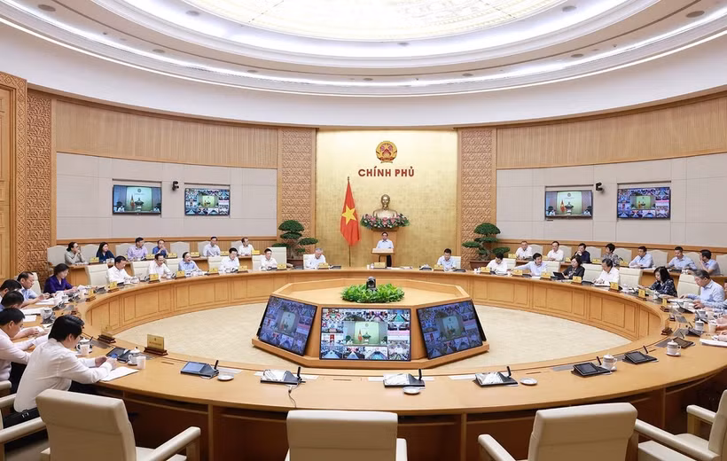 会议场景。图自越通社