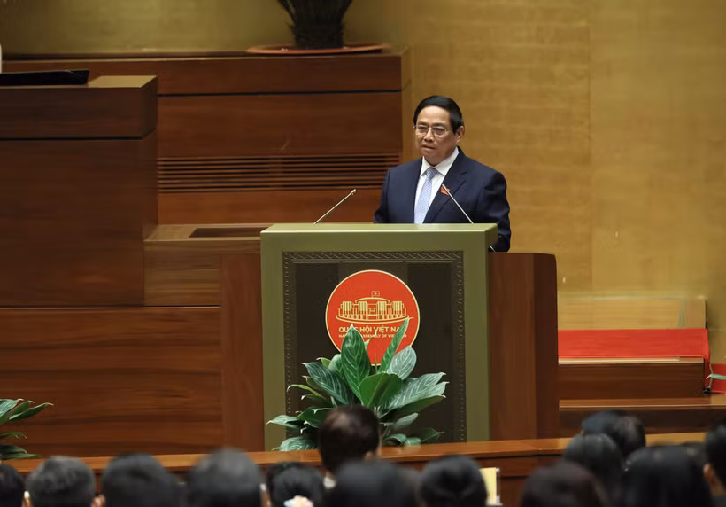越南政府总理范明政在会上发表讲话。图自越通社