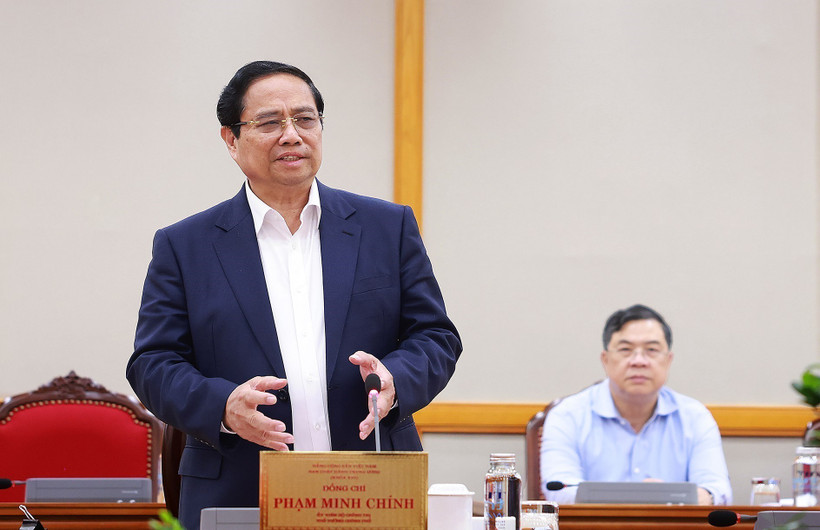 范明政总理在会上发表讲话。图自越通社