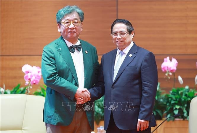 越南政府总理范明政会见全球绿色增长研究所总干事金相浃。图自越通社