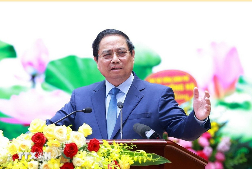 范明政总理在会上发表讲话。图自越通社