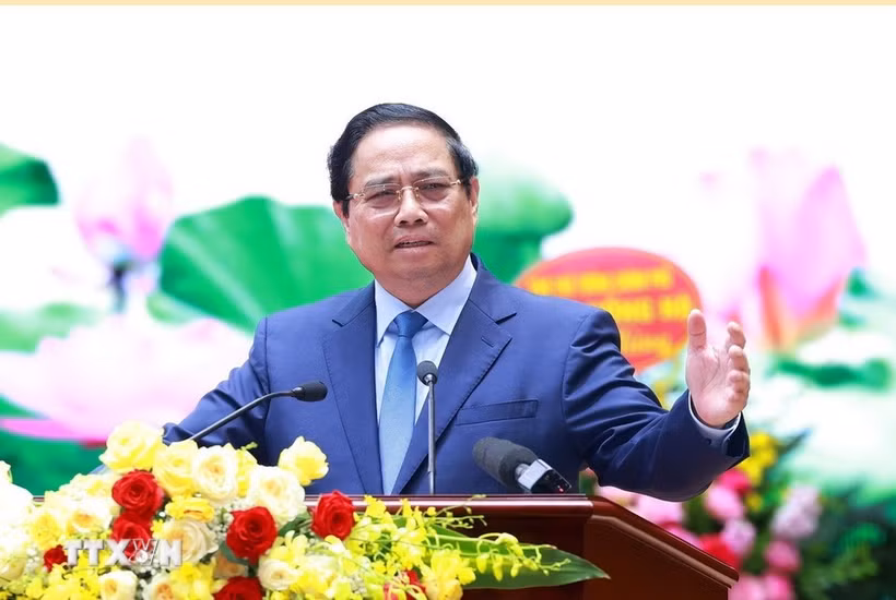 范明政总理在会上发表讲话。图自越通社