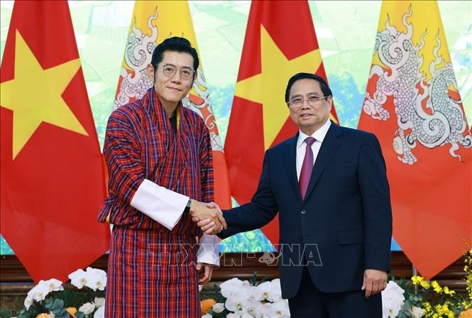 越南总理范明政会见不丹国王吉格梅。图自越通社