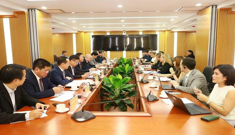 会议场景。图自人民报