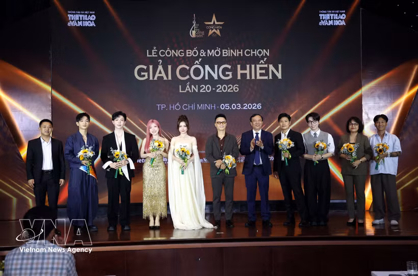 出席发布会的代表合影。图自越通社