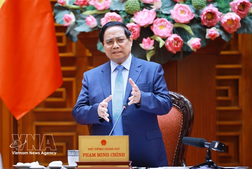 范明政在会上发表讲话。图自越通社