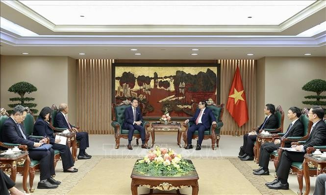 越南政府总理范明政会见世界知识产权组织总干事邓鸿森。图自越通社