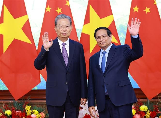 越南政府总理范明政会见中国全国人大常委会委员长赵乐际。图自越通社