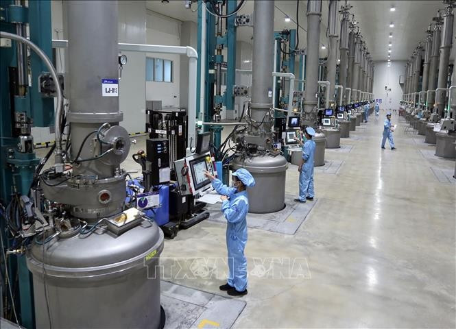 位于北宁省光州工业园越南JA Solar有限公司（中国香港投资）的太阳能电池原材料生产线。图自越通社