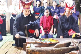 赫蒙族祭灶礼。图自nhandan.vn